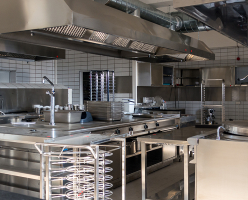 Side view of the interior of a restaurant kitchen